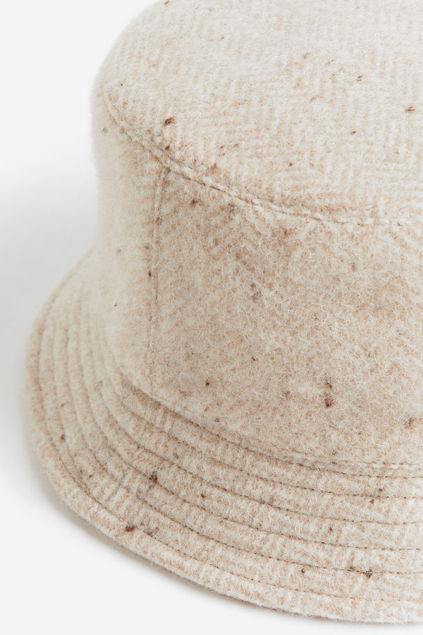 H&M Bucket Hat aus Wollmix Beige/Fischgrätmuster