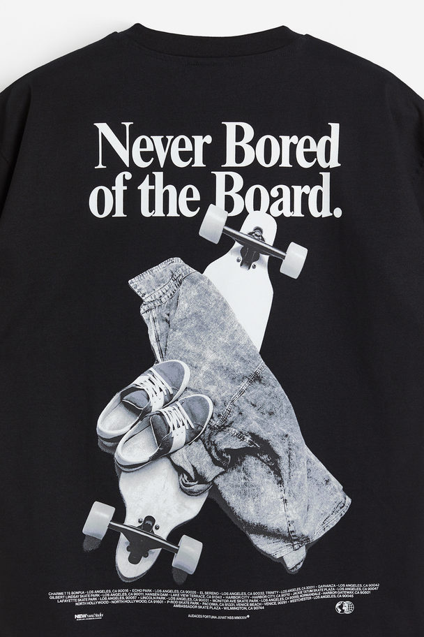 H&M Bedrucktes T-Shirt in Oversized Fit Schwarz/New Sound