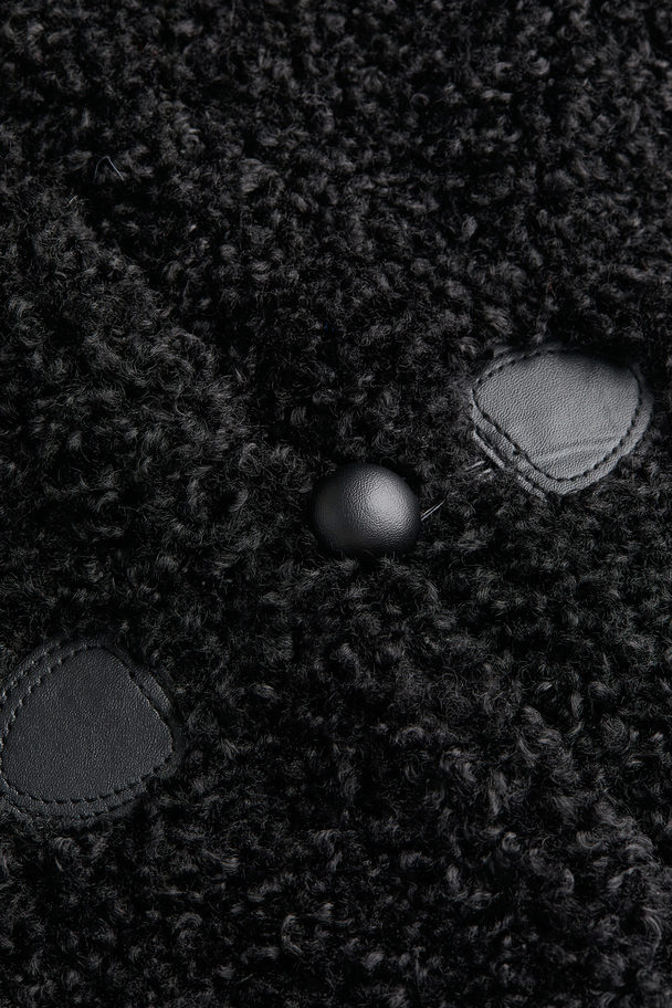 H&M Kurze Jacke aus Teddyfleece Schwarz