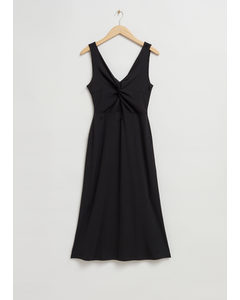 Geribbelde Midi-jurk Met Gedraaide Voorkant Zwart Geribbeld