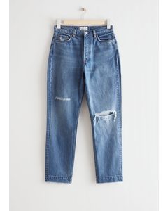 Schmal zulaufende Jeans mit mittelhohem Bund Distressed Blue
