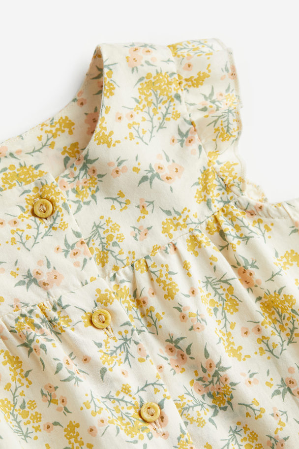 H&M Strampler aus Baumwolle Cremefarben/Gelbe Blumen