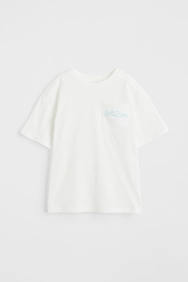 H&M Oversized T-Shirt mit Brusttasche Weiß