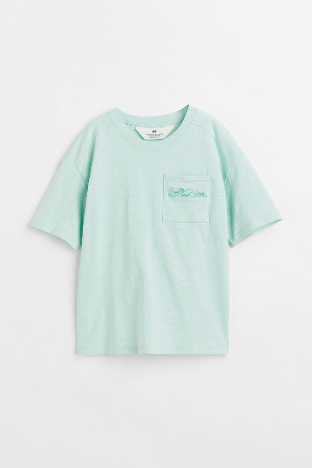 H&M Oversized Chest-pocket T-shirt Light Turquoise