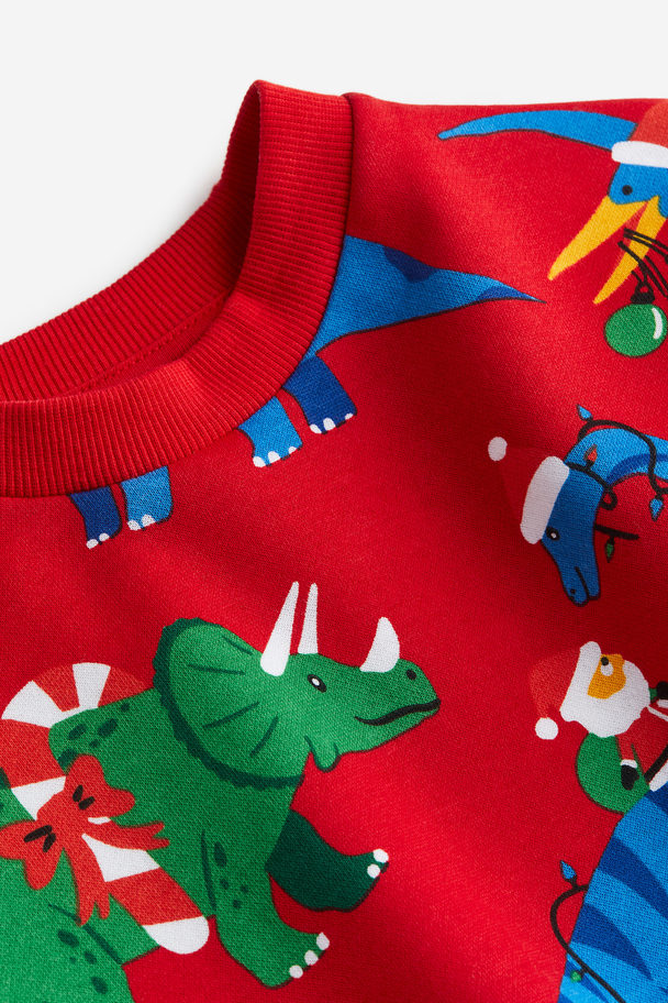 H&M Sweater Helderrood/dinosaurussen