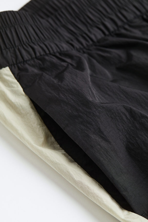 H&M Windproof Zip-hem Track Pants Black/block-coloured