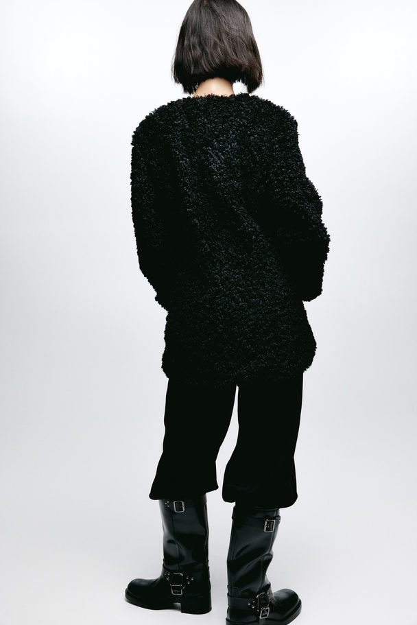 H&M Jacke aus Teddyfleece Schwarz