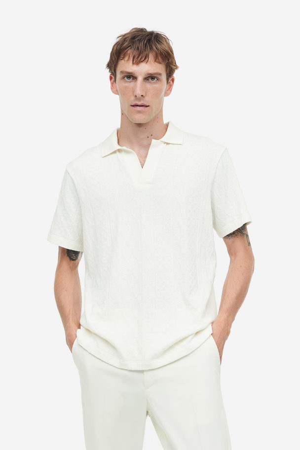 H&M Baumwoll-Poloshirt aus Strukturstrick Regular Fit Weiß