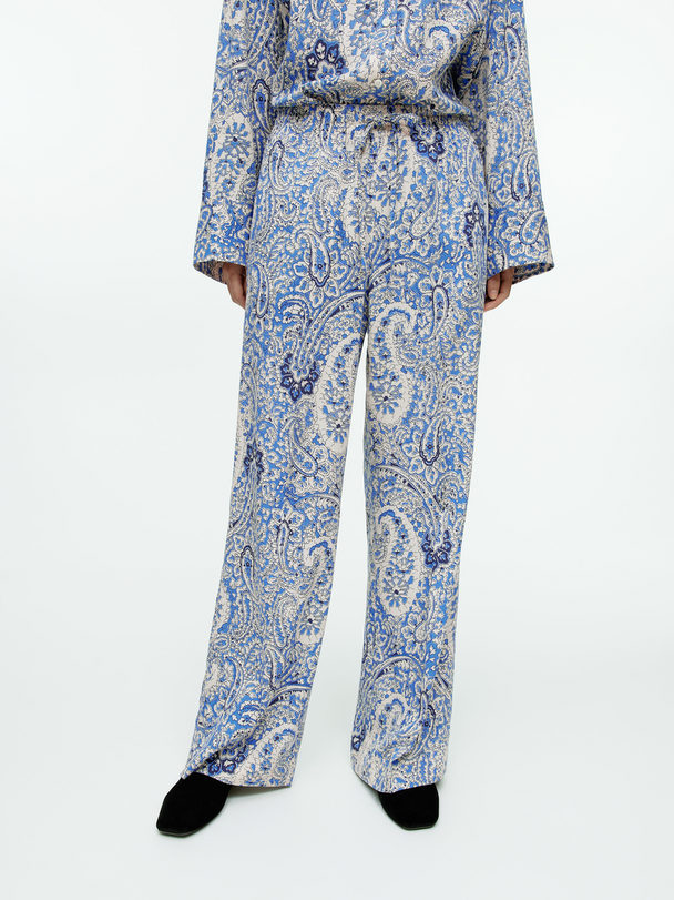 ARKET Relaxed Paisley Trousers Blue/beige