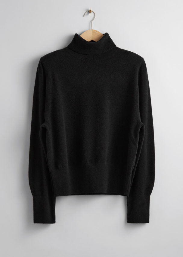 & Other Stories Rollkragenpullover aus Merinowolle Schwarz