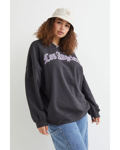 H&M+ Oversized Sweatshirt Schwarz/Los Angeles