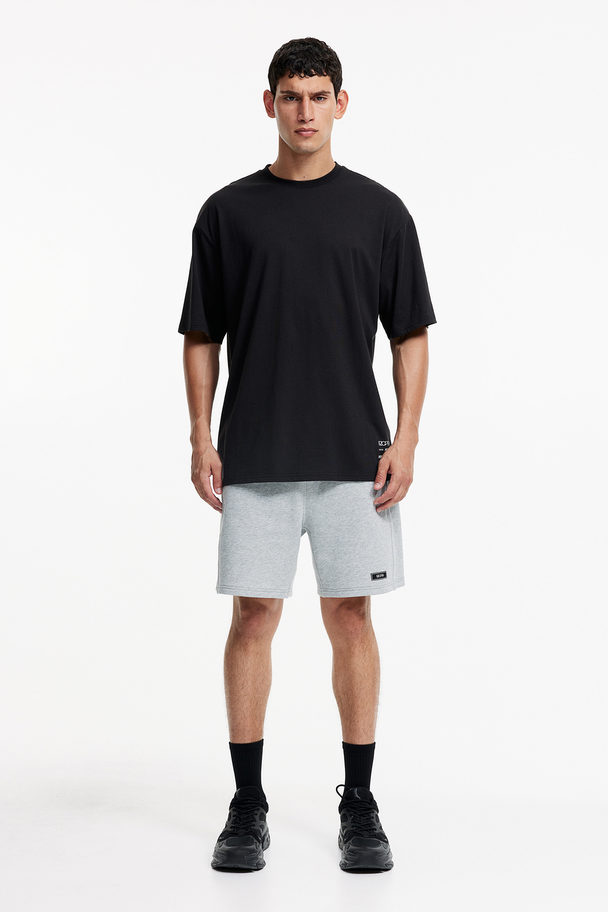 H&M Drymove™ Loose Fit Sports T-shirt With Cotton Feel Black