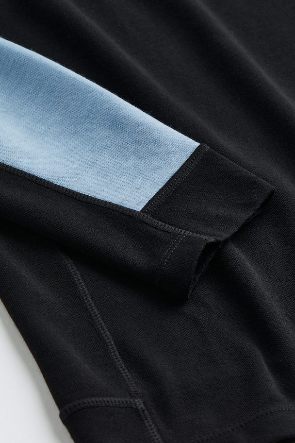 H&M Baselayer-Shirt aus Wollmix Schwarz/Hellblau