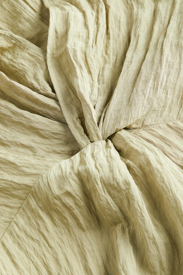 H&M Kleid aus Strukturstoff mit Knotendetail Helles Pistaziengrün