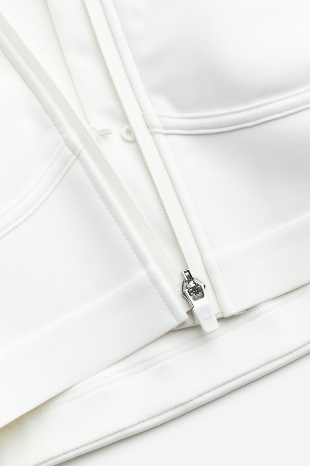 H&M High Support DryMove™ Sport-BH mit Zipper Weiß