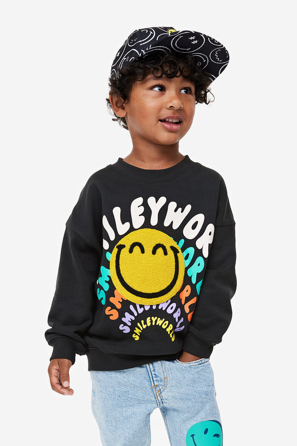 H&M Oversized Sweatshirt Med Motiv Sort/smileyworld®