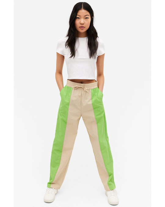 Monki Two Tone Track Pants With Ankle Zips Beige & Green