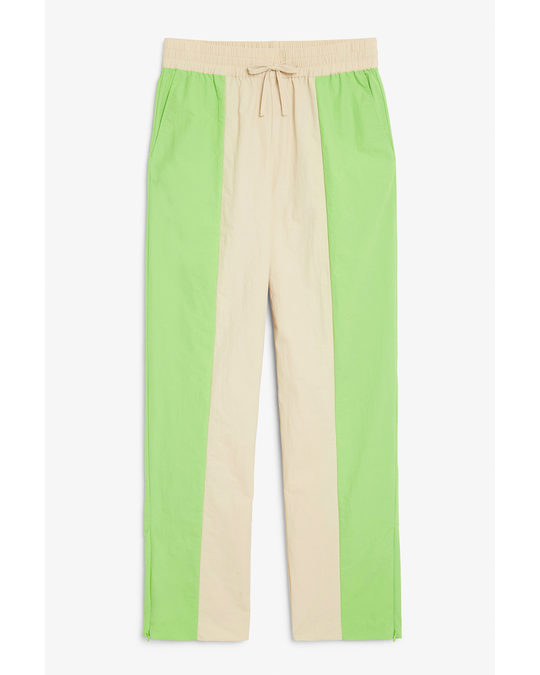 Monki Two Tone Track Pants With Ankle Zips Beige & Green