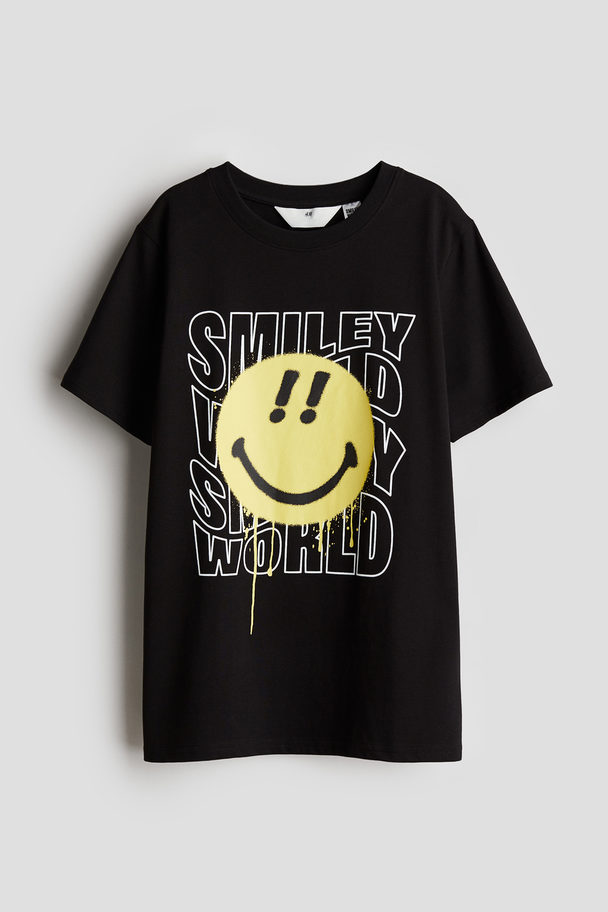 H&M T-Shirt mit Print Schwarz/SmileyWorld®