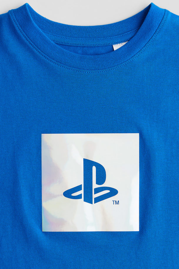 H&M T-Shirt mit Print Knallblau/PlayStation