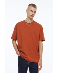T-shirt I Bomuld Oversized Fit Brændt Orange