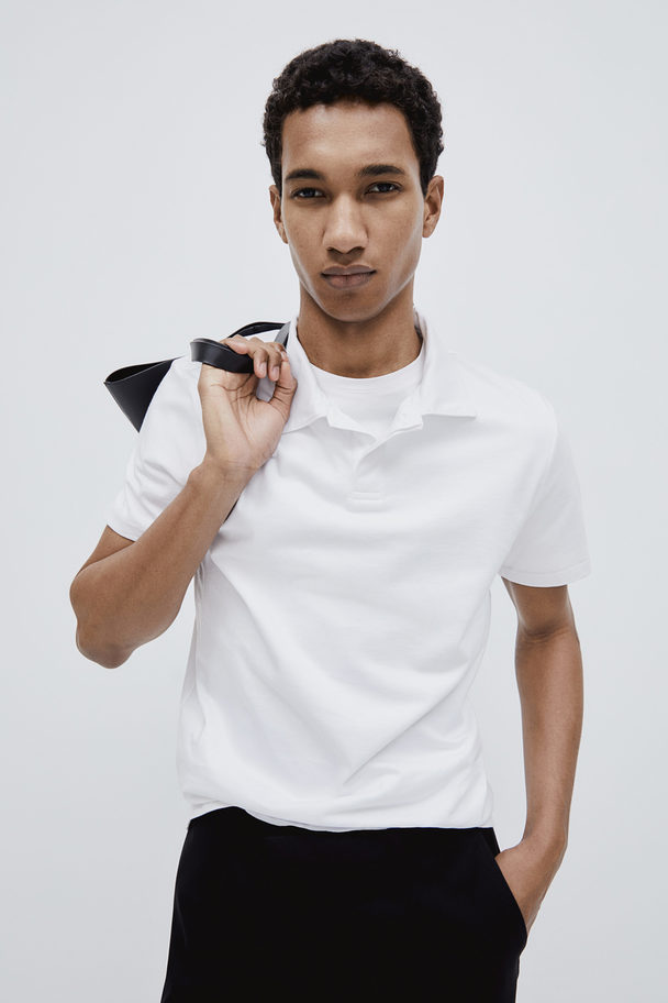 H&M Poloshirt in Muscle Fit Weiß