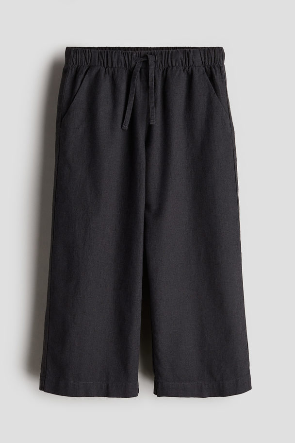 H&M Weite Schlupfhose aus Leinenmix Dunkelgrau