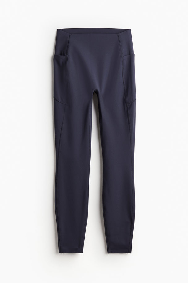 H&M DryMove™ Sportleggings mit Taschendetails Stahlblau