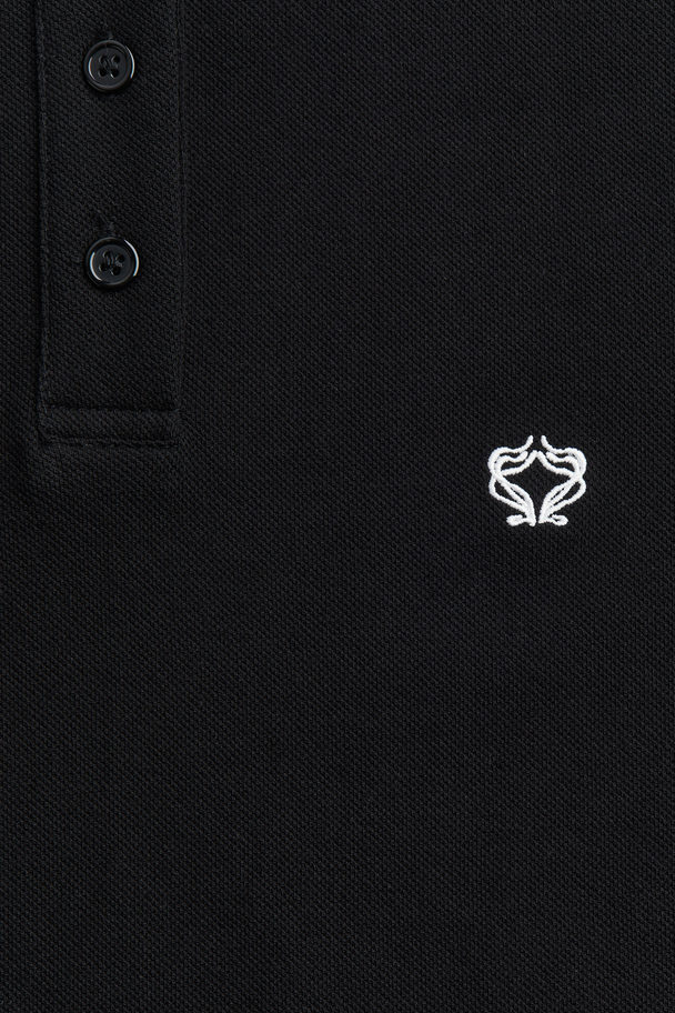 H&M Kort Piqué Poloshirt Zwart