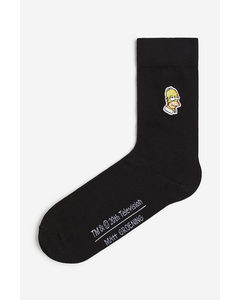 Socken mit Motiv Schwarz/Die Simpsons