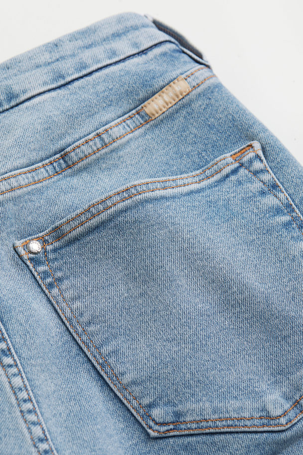 H&M Embrace High Ankle Jeans Licht Denimblauw
