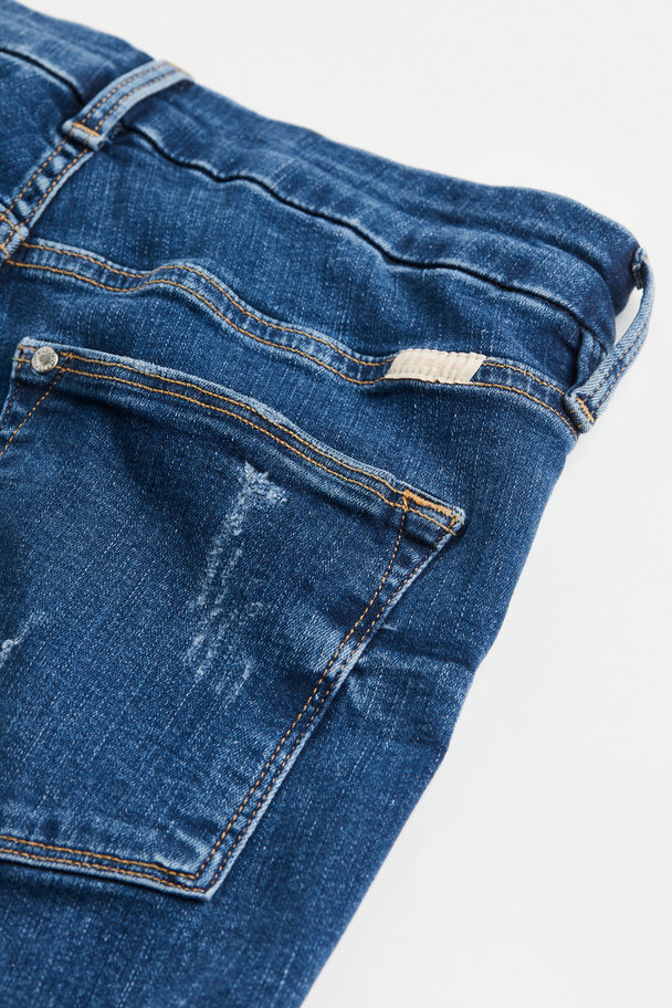 H&M Embrace High Ankle Jeans Mellomblå