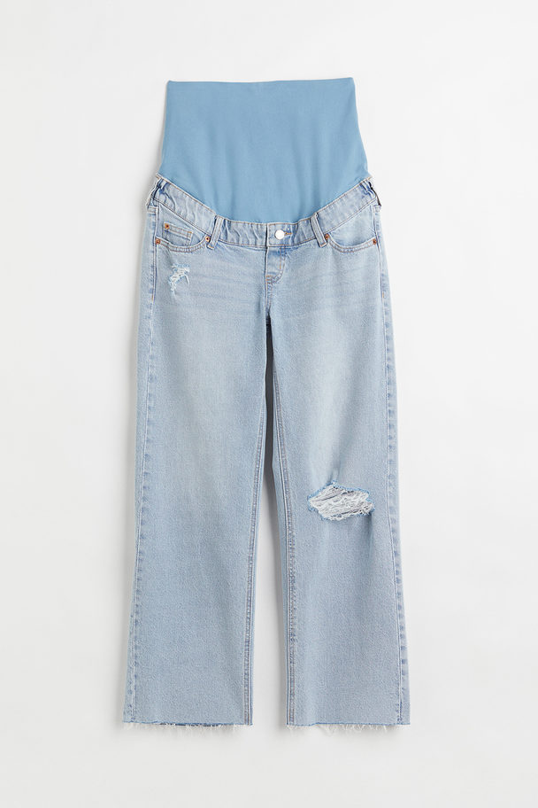 H&M MAMA Wide High Ankle Jeans Hellblau