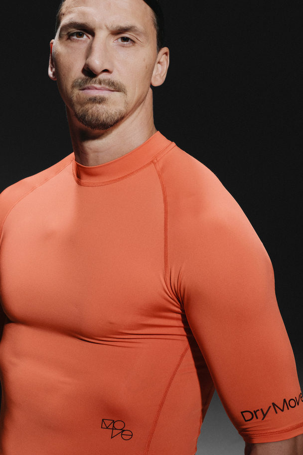 H&M Drymove™ Muscle Fit Trenings-t-shirt Orange