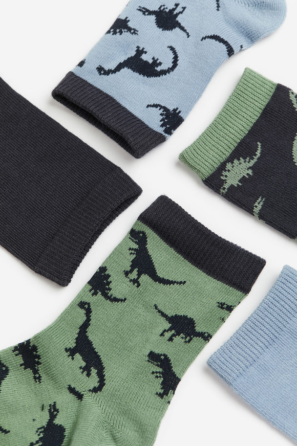 H&M 7er-Pack Gemusterte Socken Mattgrün/Dinosaurier