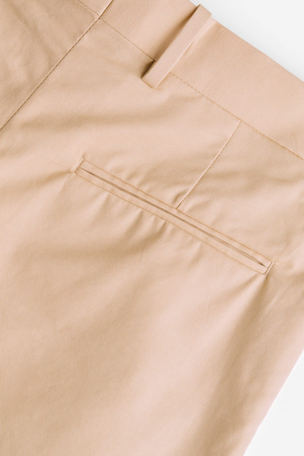 H&M Loose Fit Tailored Twill Trousers Beige