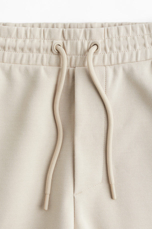 H&M Sweatshorts in Regular Fit Beige