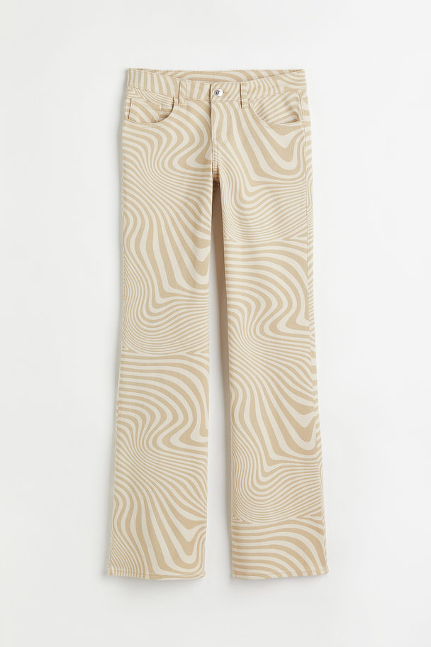 H&M Low Waist Flared Twill Trousers Beige/patterned