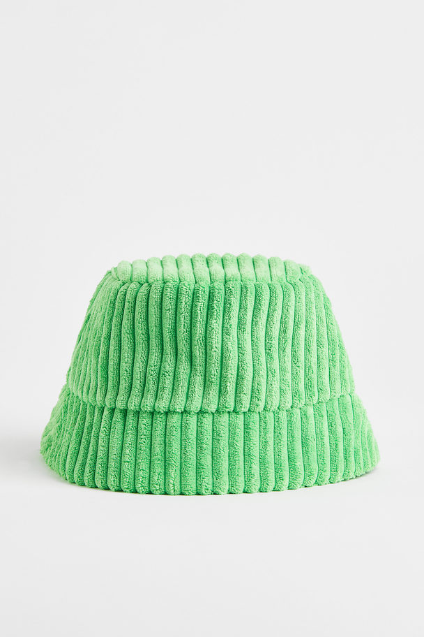 H&M Bucket Hat aus Cord Knallgrün