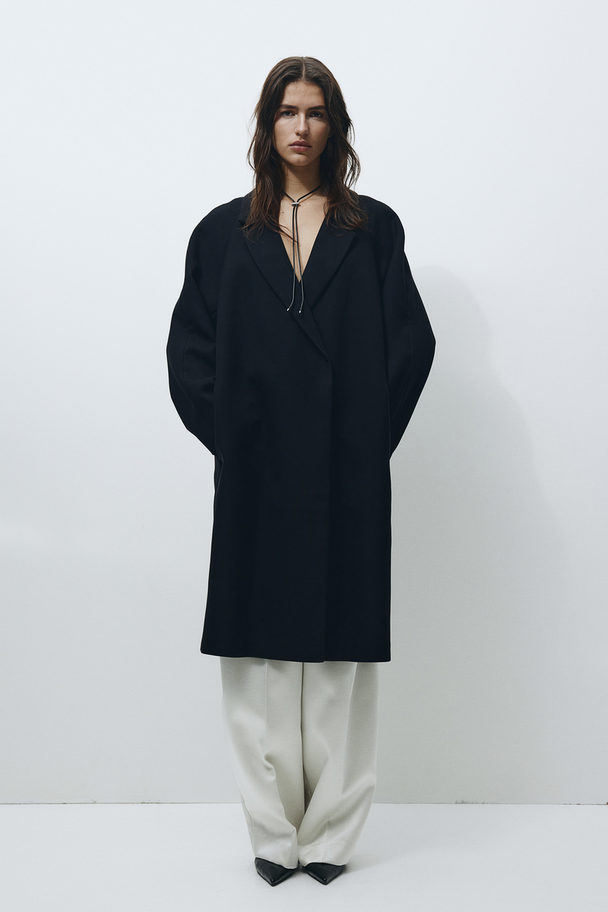 H&M Zweireihiger Mantel in Midilänge Schwarz