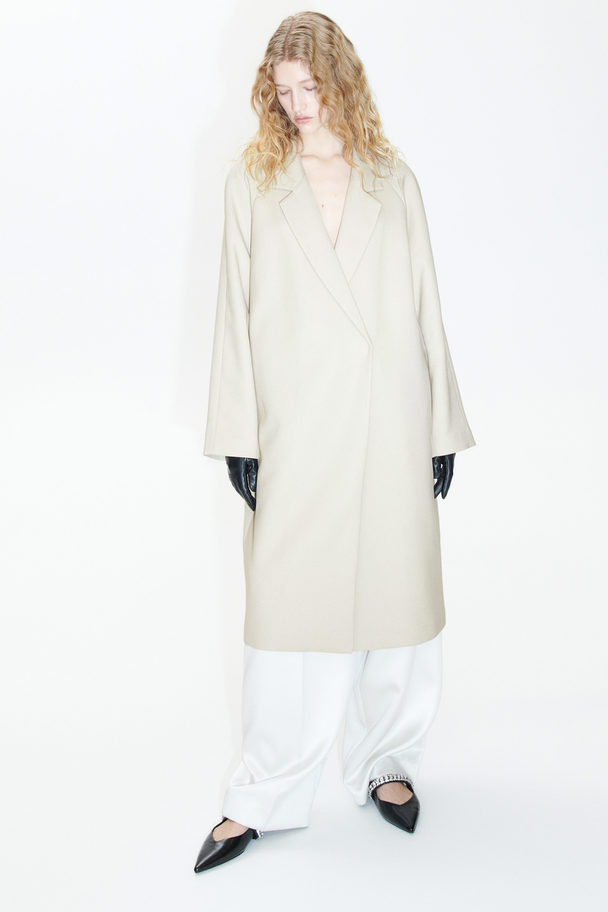 H&M Zweireihiger Mantel in Midilänge Hellbeige