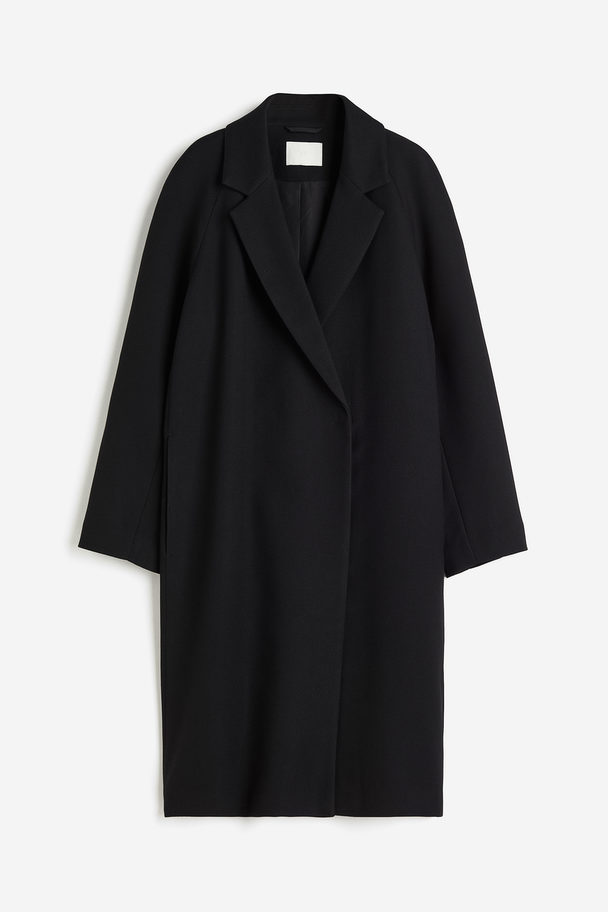H&M Zweireihiger Mantel in Midilänge Schwarz