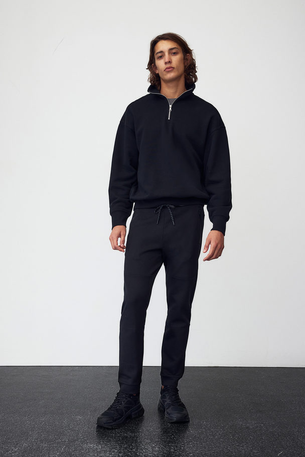 H&M Drymove™ Tapered Tech Joggers With Zipped Pockets Black