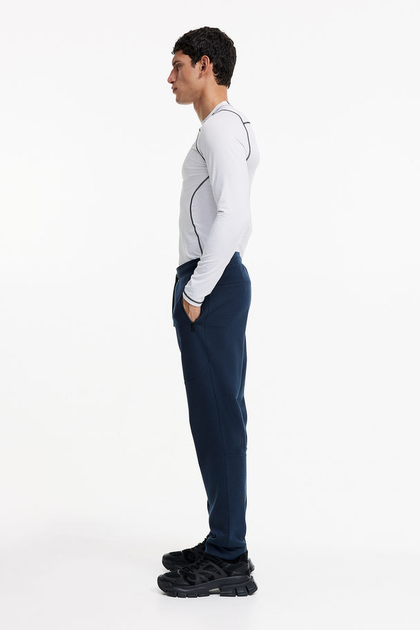 H&M Drymove™ Tapered Tech Joggers With Zipped Pockets Navy Blue