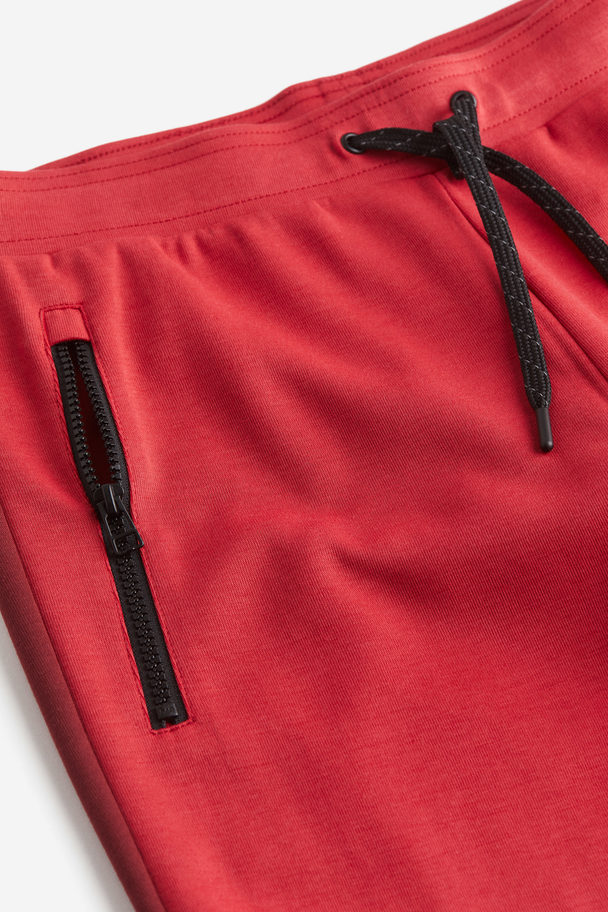 Drymove™ Tapered Tech Joggers With Zipped Pockets Dark Red/block