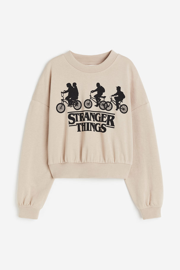H&M Oversized Sweatshirt Beige/Stranger Things