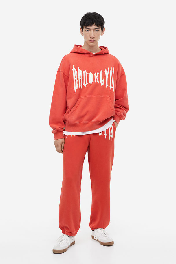 H&M Capuchonsweater Met Print - Oversized Fit Rood/brooklyn