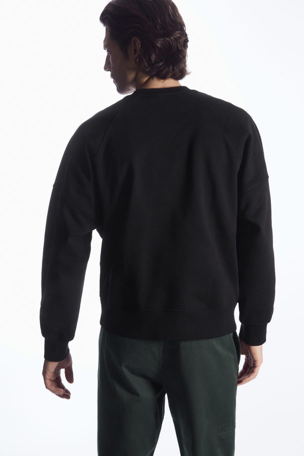 COS Oversized Exposed-seam Sweatshirt Black