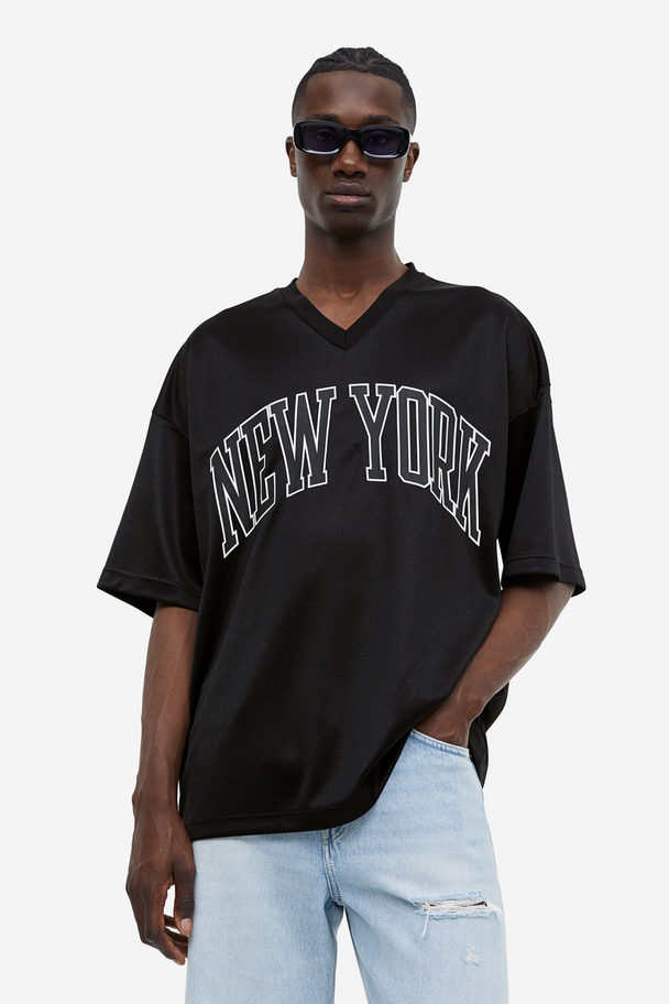 H&M Oversized T-Shirt aus Mesh mit Print Schwarz/New York