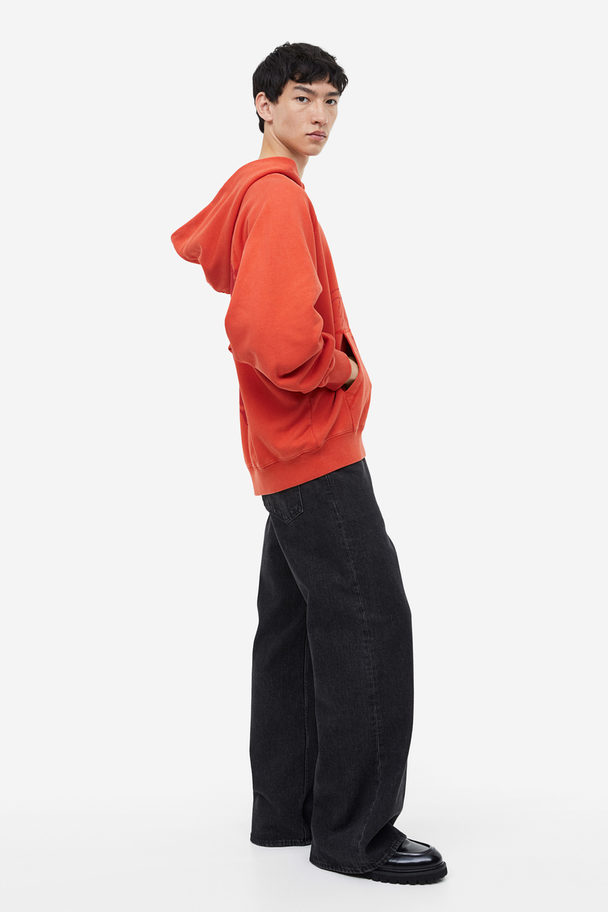 H&M Bedruckter Hoodie in Oversized Fit Rot